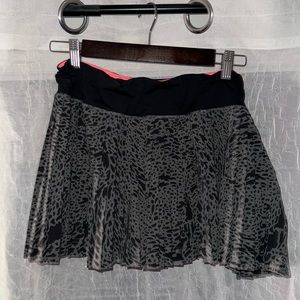 Grey pleated golf skort
